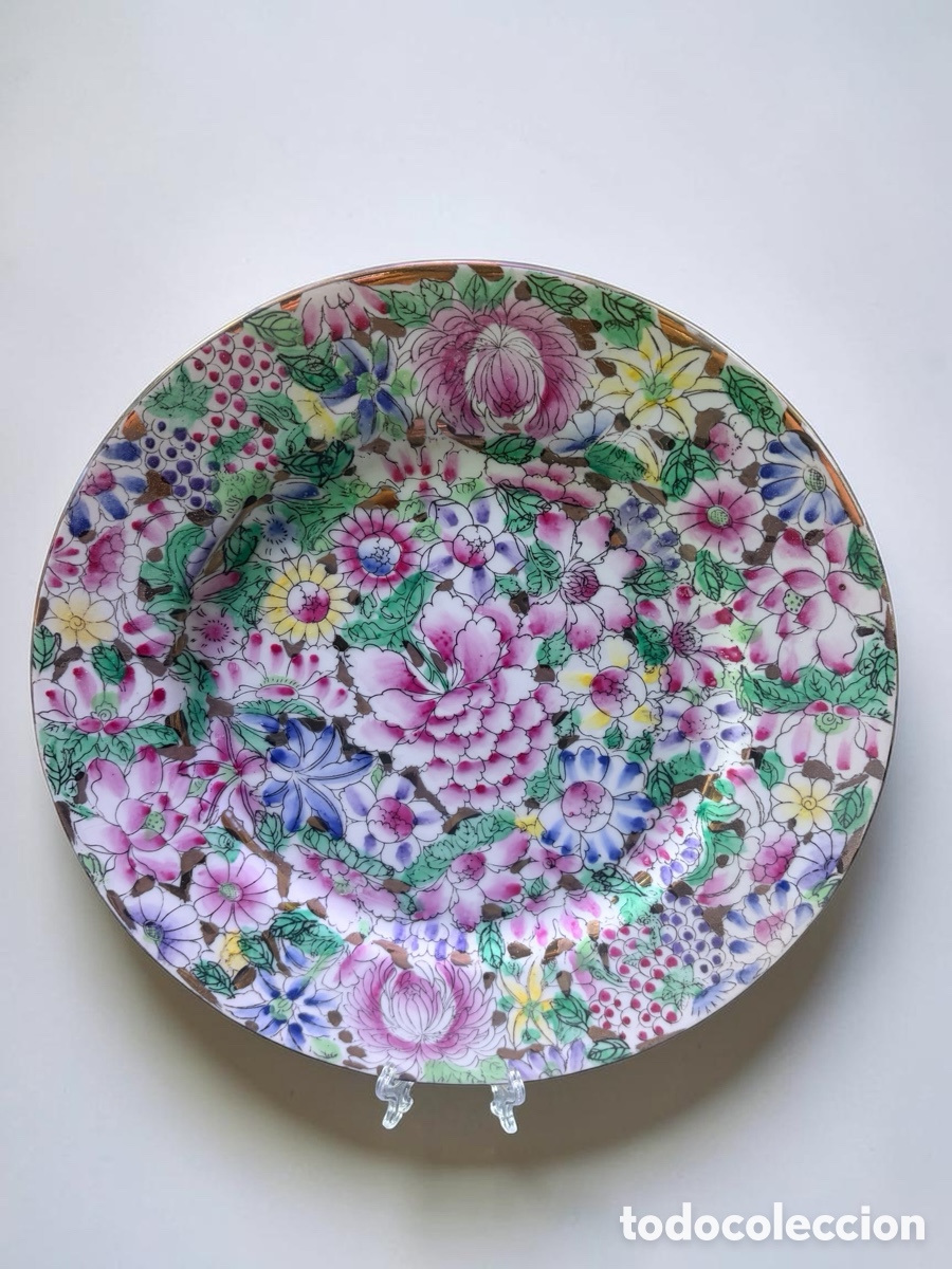 Antig&uuml;edades: Plato de porcelana de Macao milflores 26cm