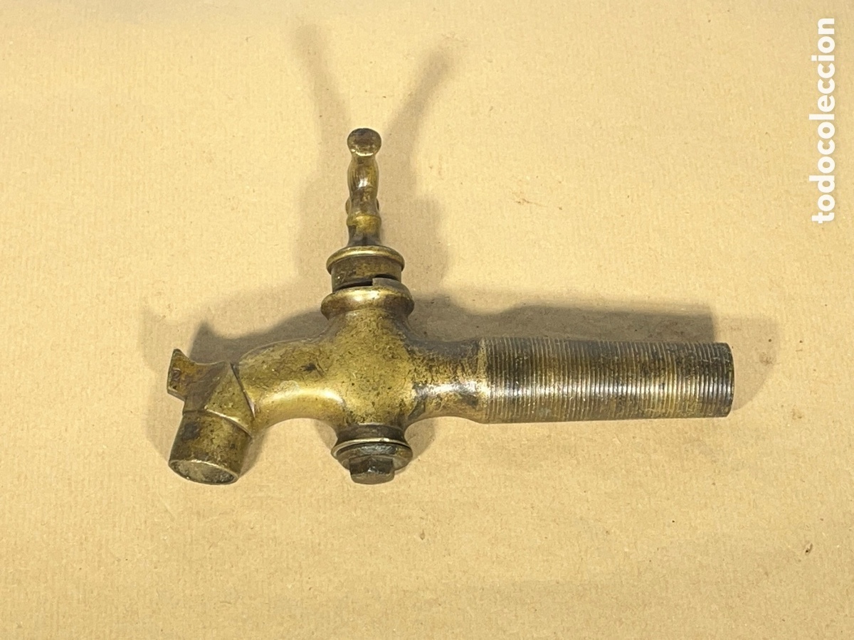 Antig&uuml;edades: Antiguo Grifo de Bronce de Rosca. A/J
