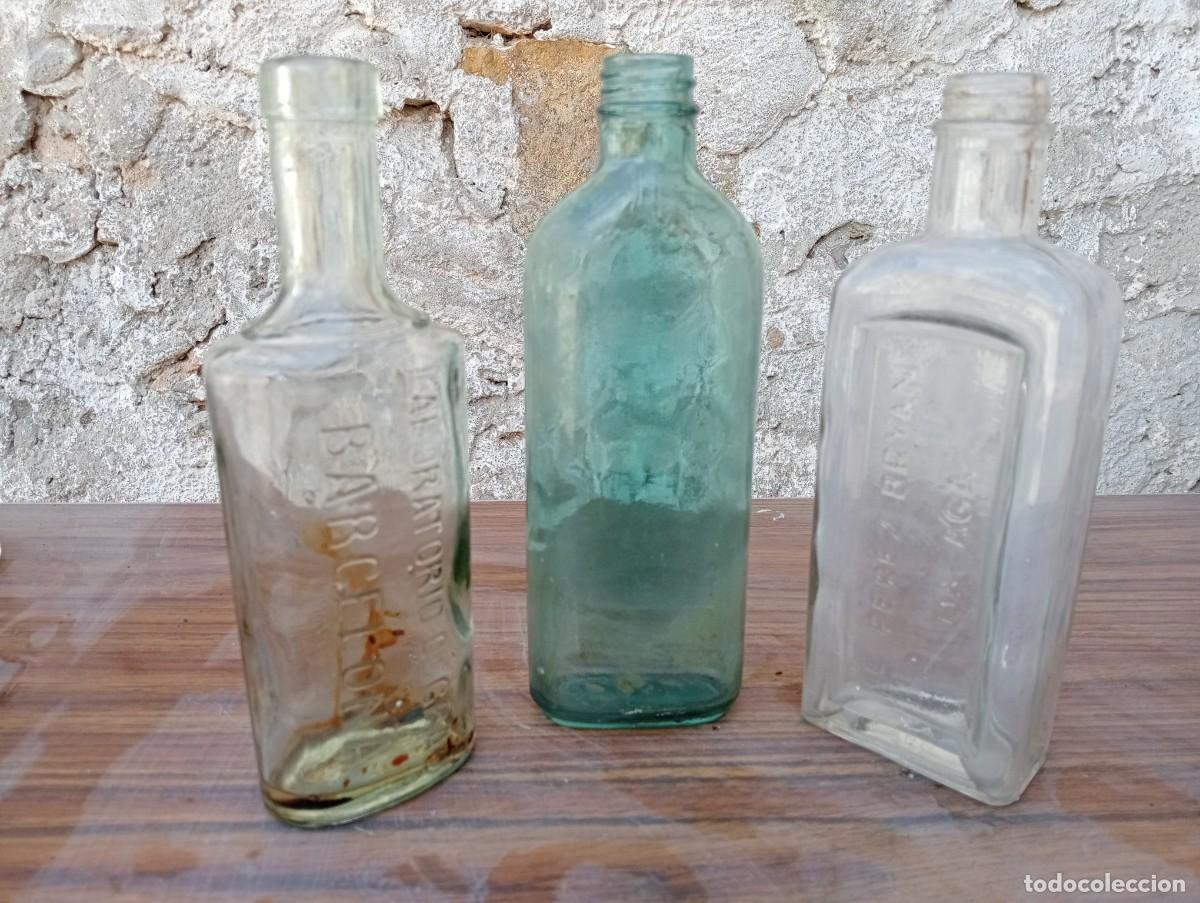 Antig&uuml;edades: ANTIGUAS BOTELLAS FARMACIA LABORATORIO GRAU BARCELONA PEREZ BRIAN M&Aacute;LAGA MEDICAMENTOS