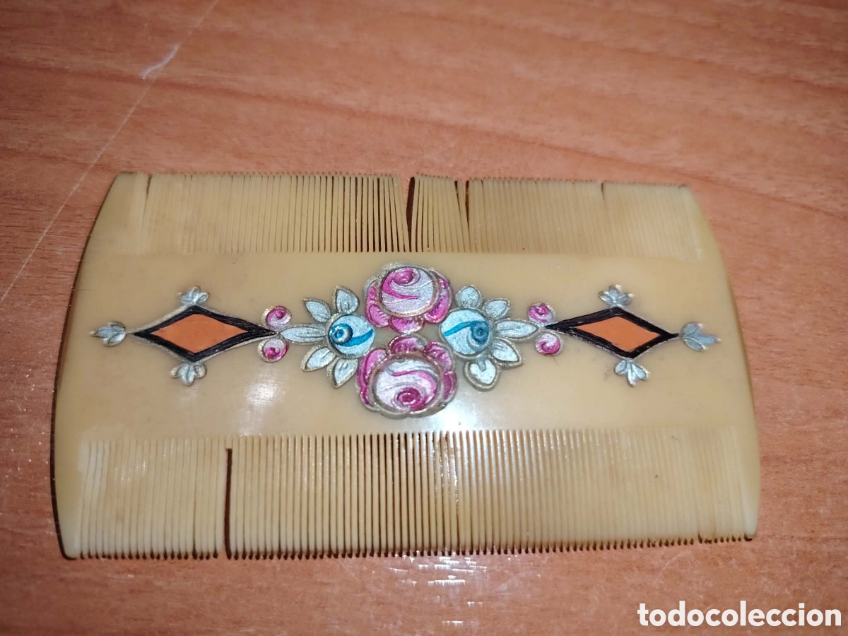 Antig&uuml;edades: Peine antiguo de 2 costados . Decorado a mano.