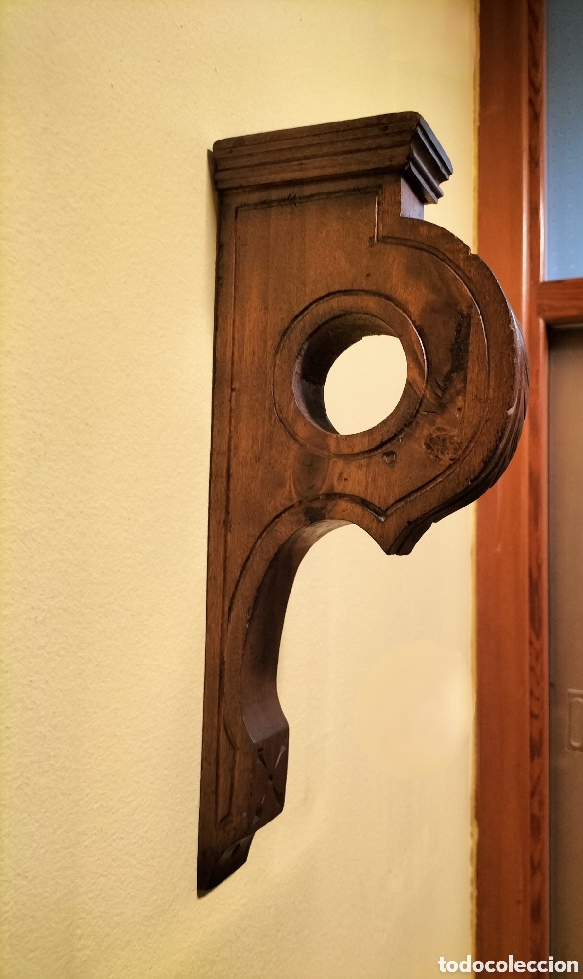 Antig&uuml;edades: Soportes de madera para barra de cortina