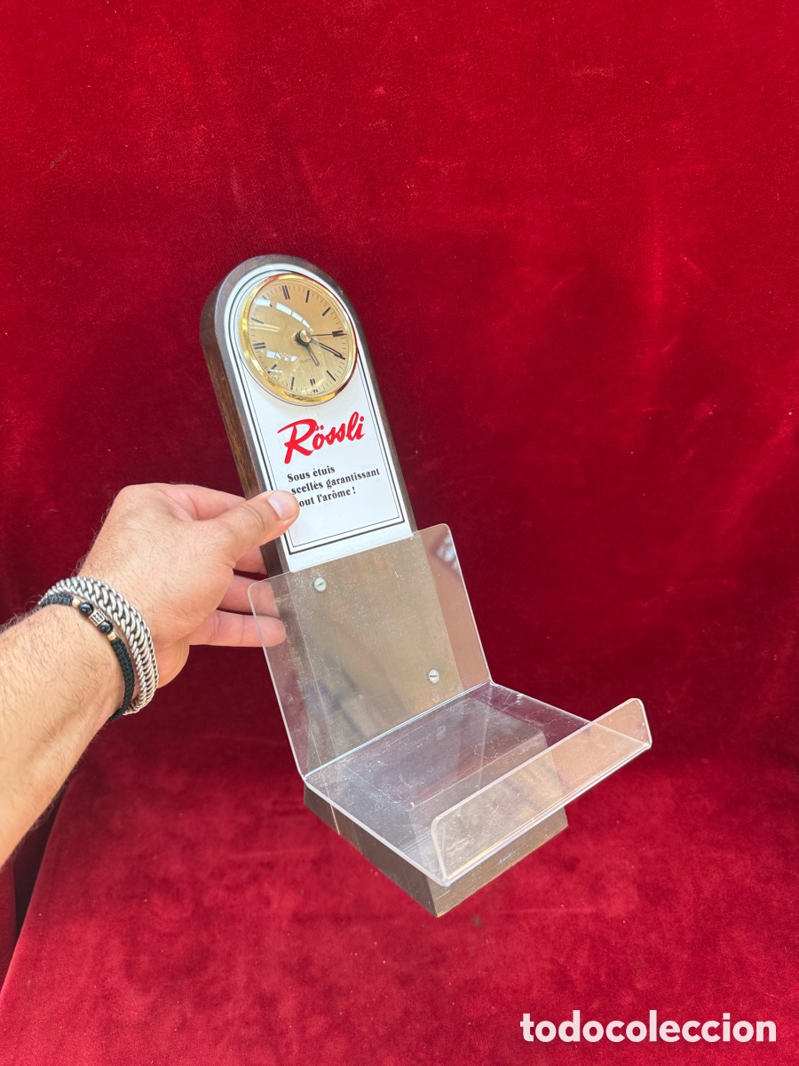 Antig&uuml;edades: Antiguo reloj con expositor,Propaganda Rossli!