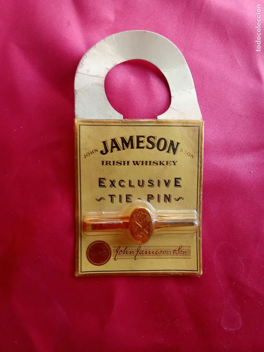Antig&uuml;edades: Pin de corbata de Jameson, Alfiler, pisacorbatas. Caja Mecheros