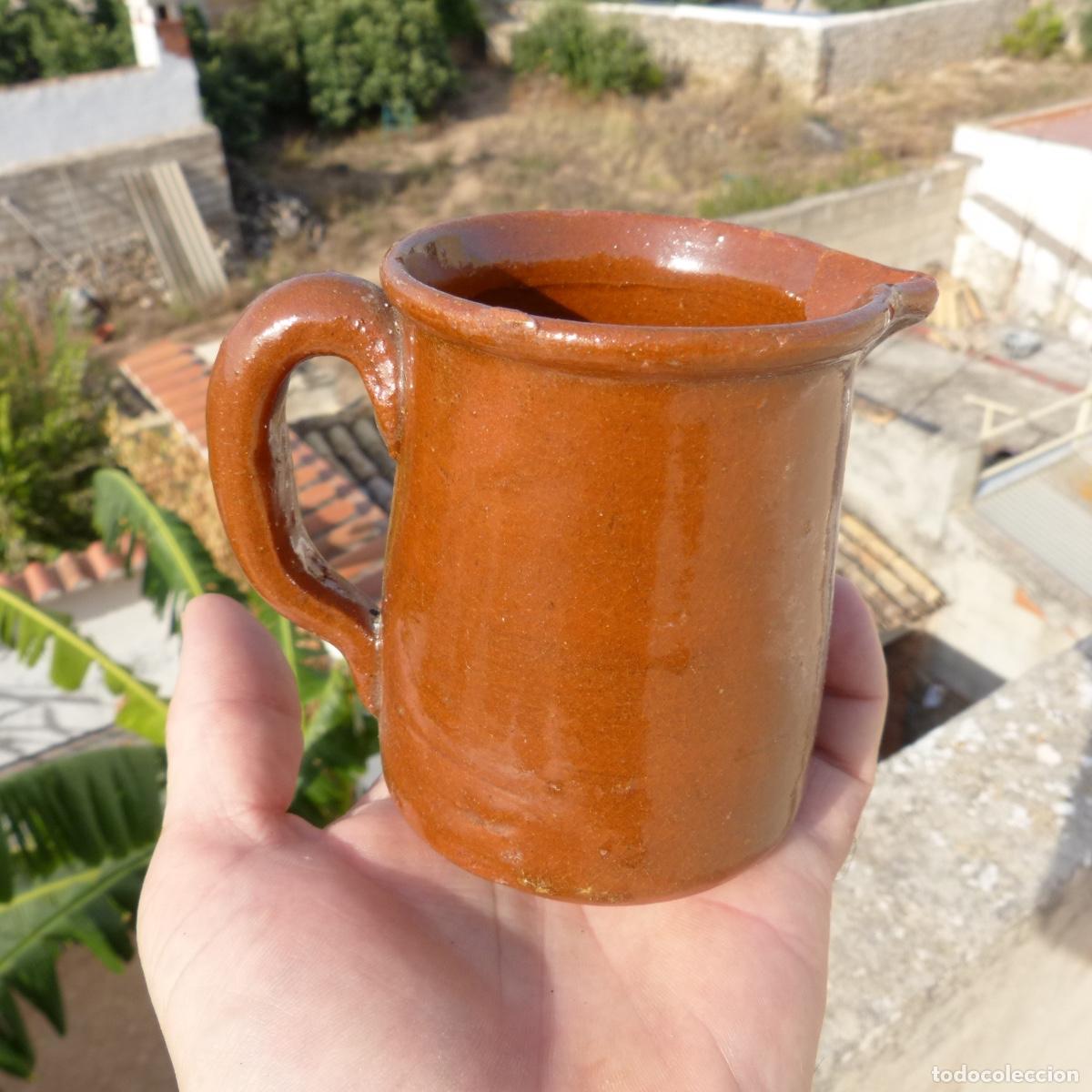 Antig&uuml;edades: Peque&ntilde;a jarra de ceramica tradicional melada, 223gr, 9,3cm.