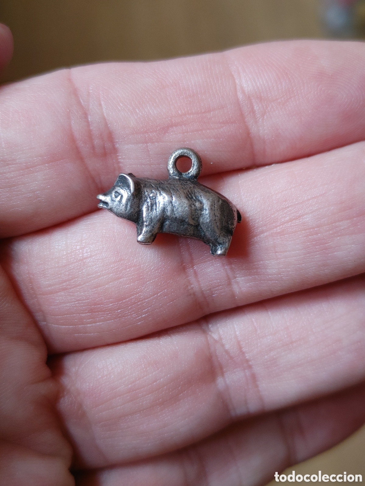 Antig&uuml;edades: Colgante cerdito. En plata.