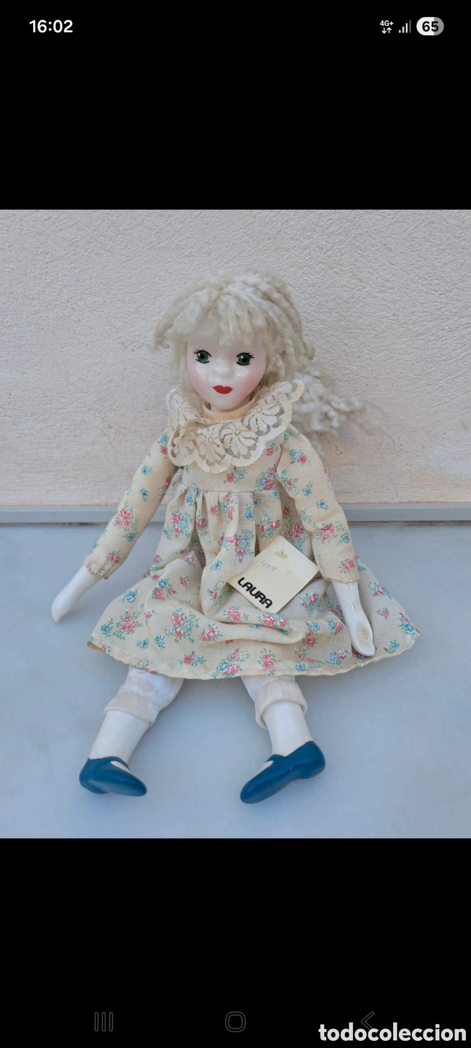 Antig&uuml;edades: Mu&ntilde;eca coleccionable de ceramica y tela