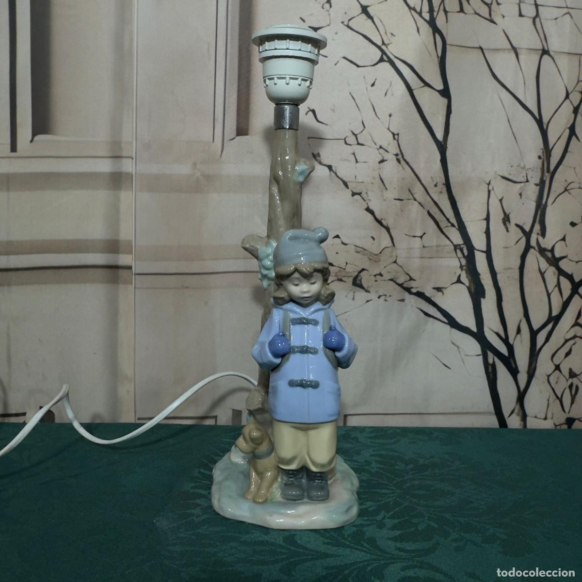 Antig&uuml;edades: L&aacute;mpara de mesa vintage est&aacute; realizada en porcelana artesanal de NAO (por Lladr&oacute;)