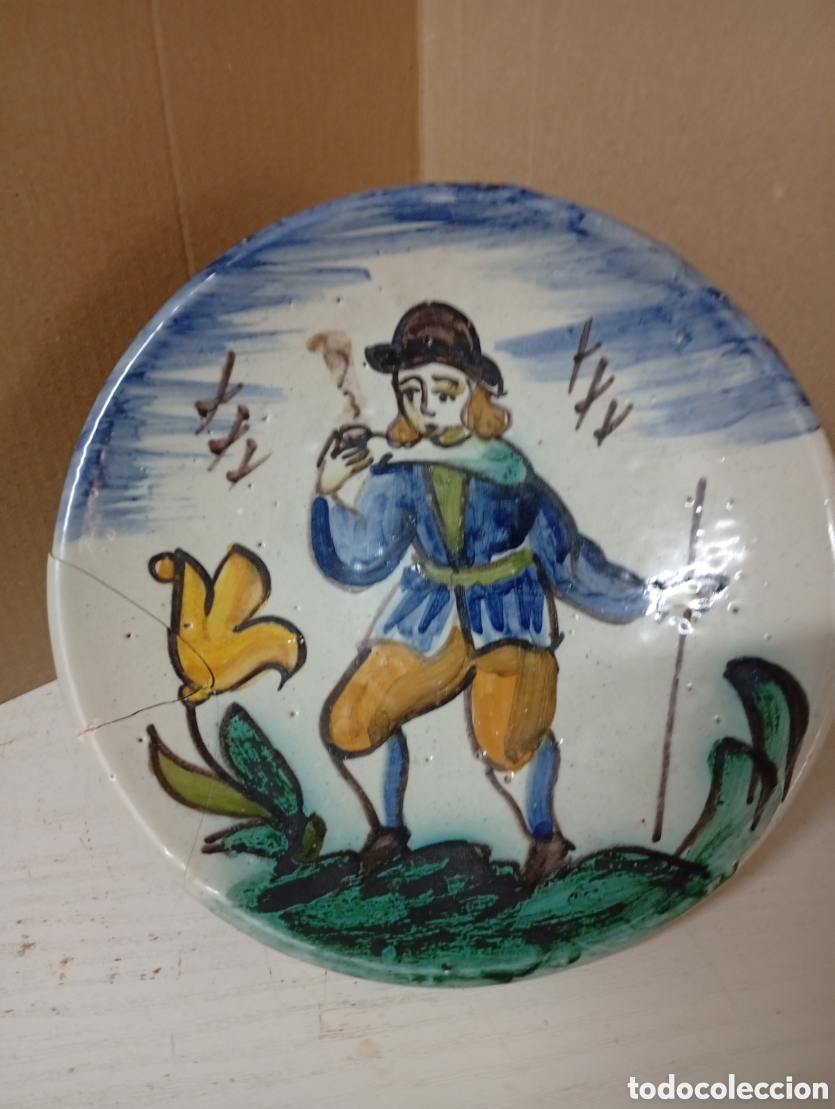 Antig&uuml;edades: Plato decorativo hombre fumando