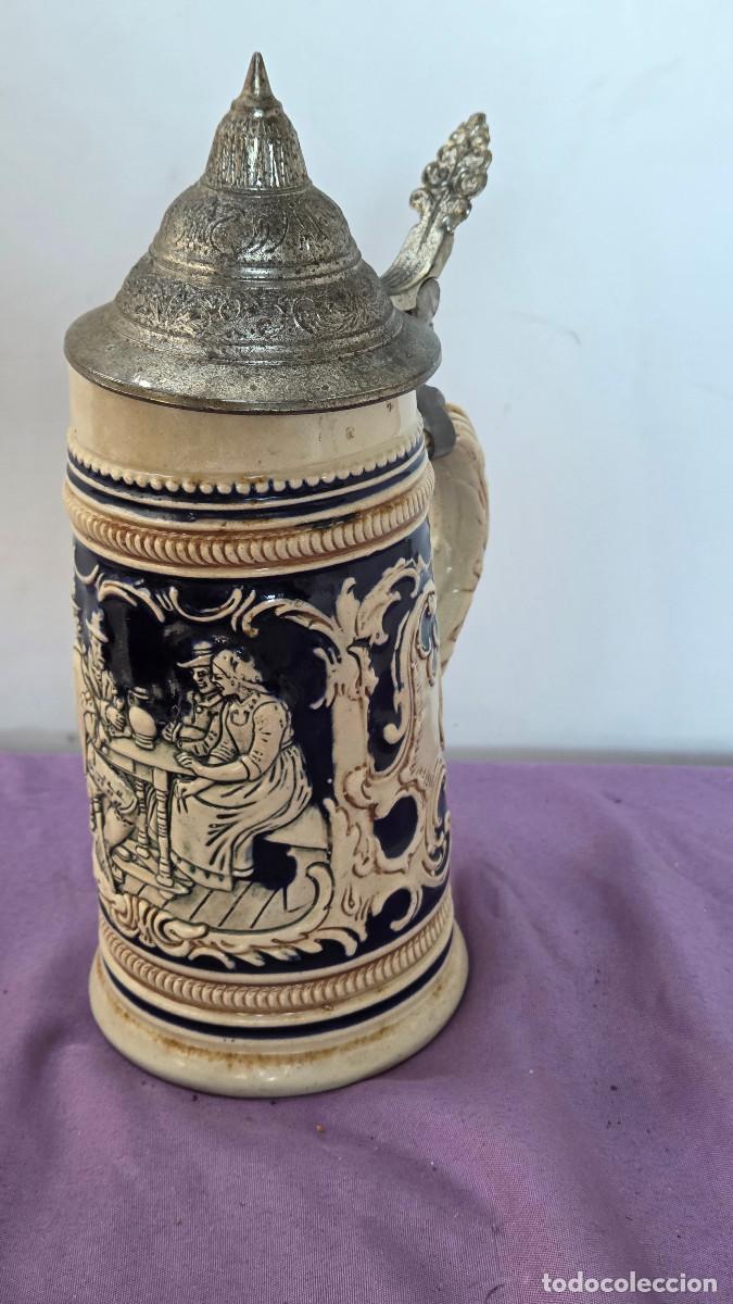 Antig&uuml;edades: jarra de ceramica y esta&ntilde;o