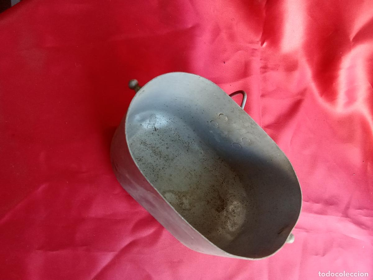 Antig&uuml;edades: Base antigua de cantimplora. Caja almacen 1
