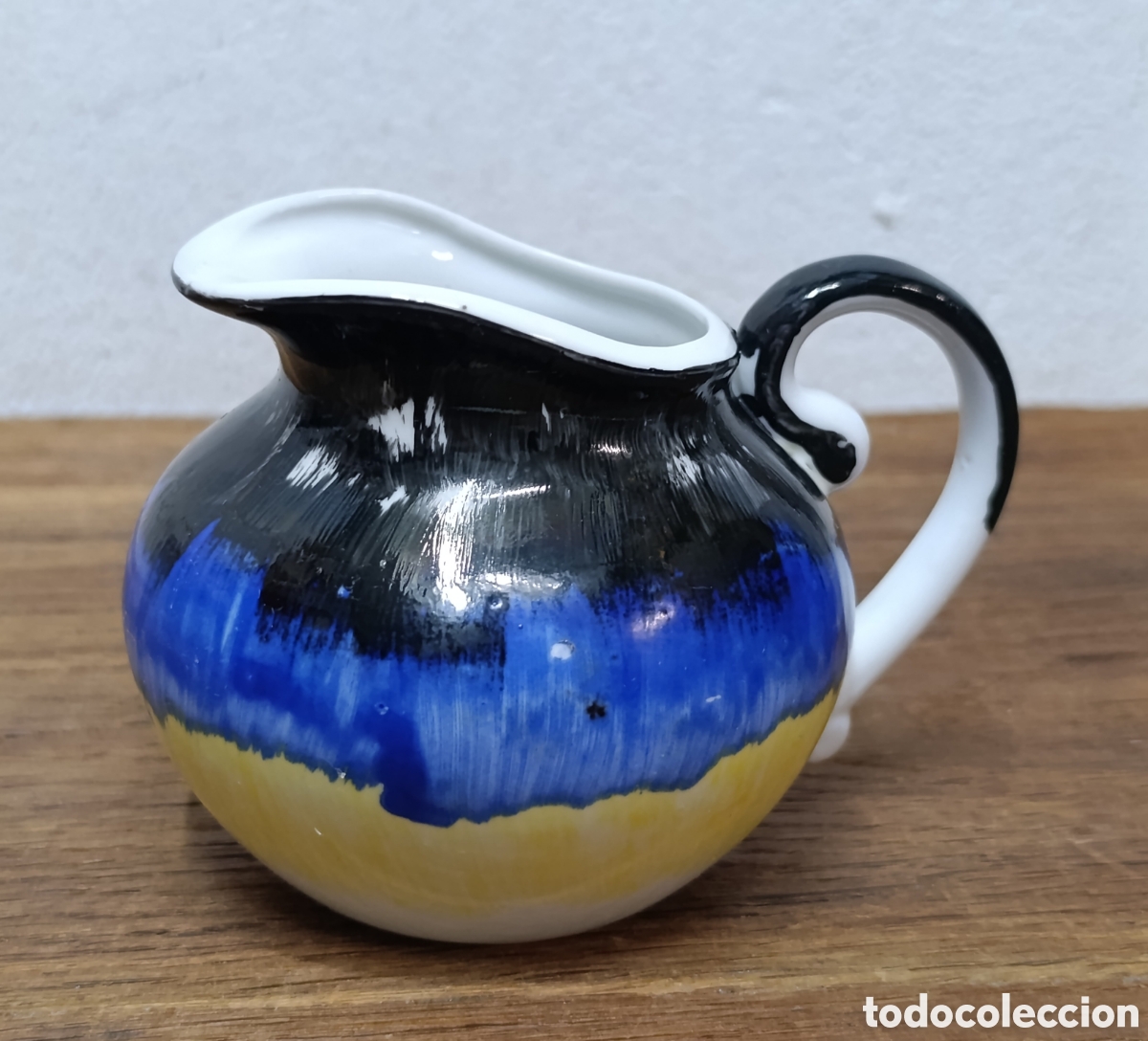Antig&uuml;edades: ANTIGUA LECHERA DE PORCELANA O CASTRO SARGADELOS, DISE&Ntilde;O DE ISSAC D&Iacute;AZ, SELLO DEL DOLMEN, A&Ntilde;OS 50.