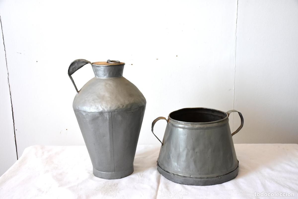 Antig&uuml;edades: Conjunto de antiguas lecheras de zinc