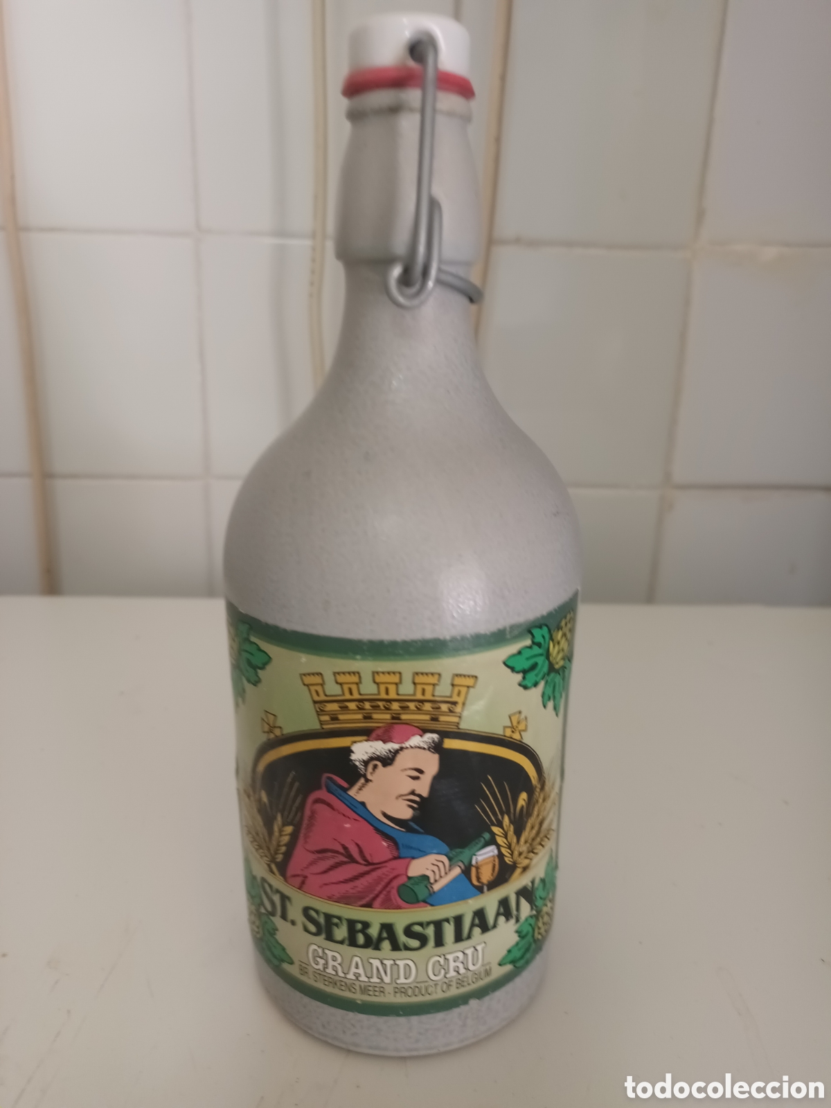 Antig&uuml;edades: ANTIGUA BOTELLA DE PORCELANA DE LA CERVEZA BELGA ST. SEBASTIAAN GRAND CRU