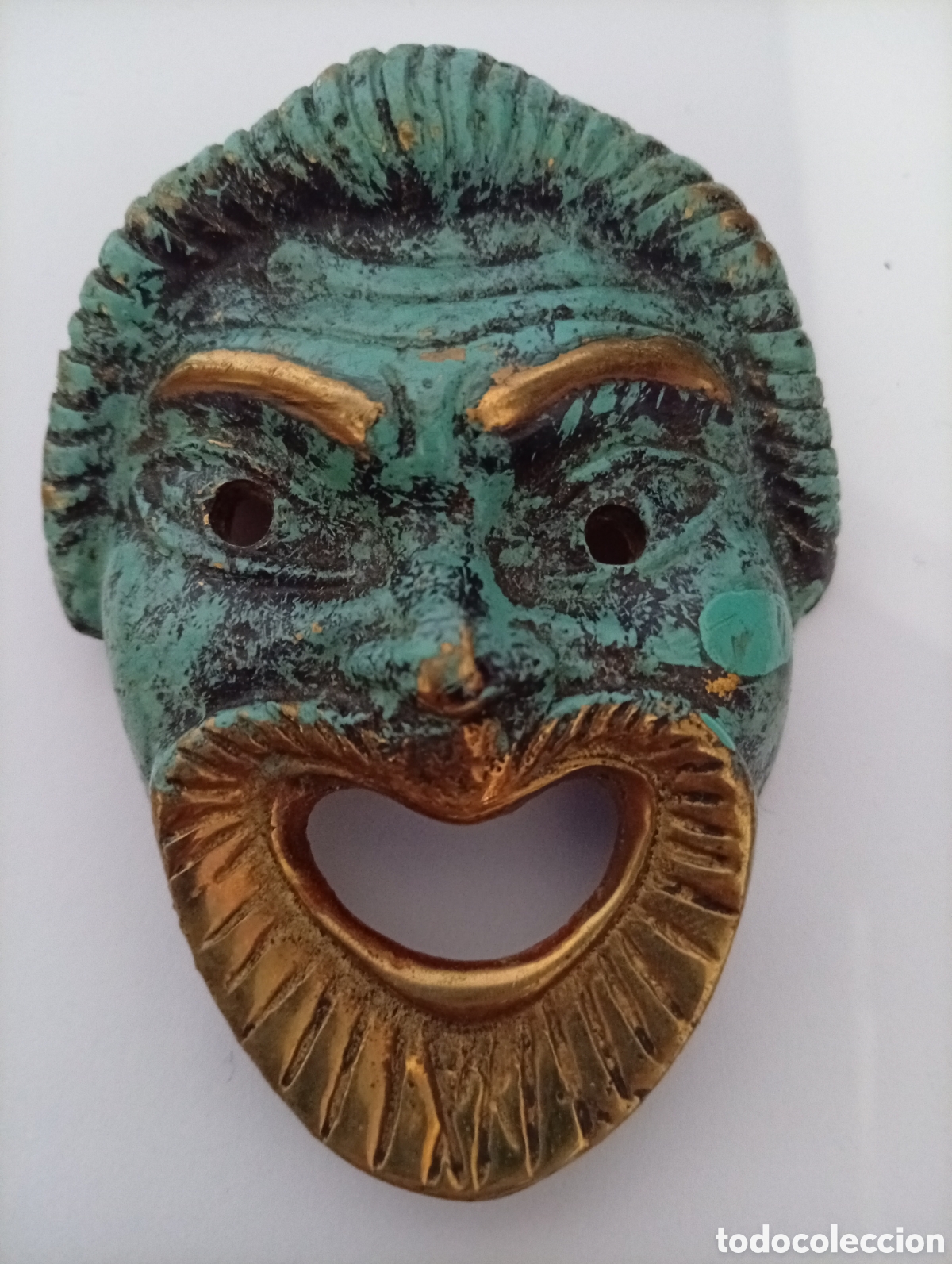 Antig&uuml;edades: Rostro de bronce para colgar