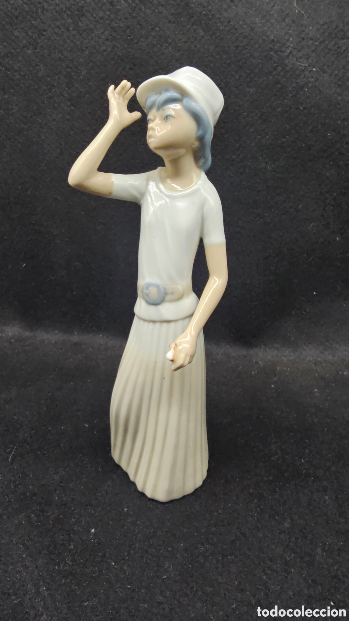 Antig&uuml;edades: Antigua figura de porcelana