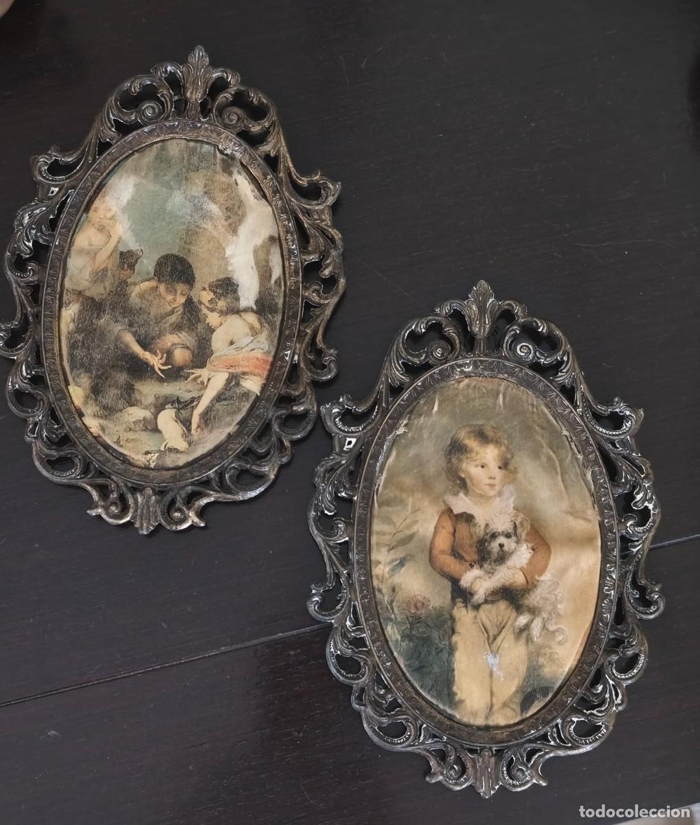 Antig&uuml;edades: Pareja de marcos ovalados met&aacute;lico de estilo barroco.