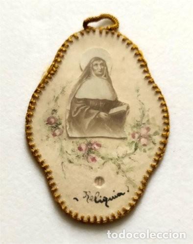 Antiguidades: Reliquia de Santa Juana de Lestonnac. Imagen de la santa y reliquia y escudo de la Compa&ntilde;&iacute;a de Mar&iacute;a