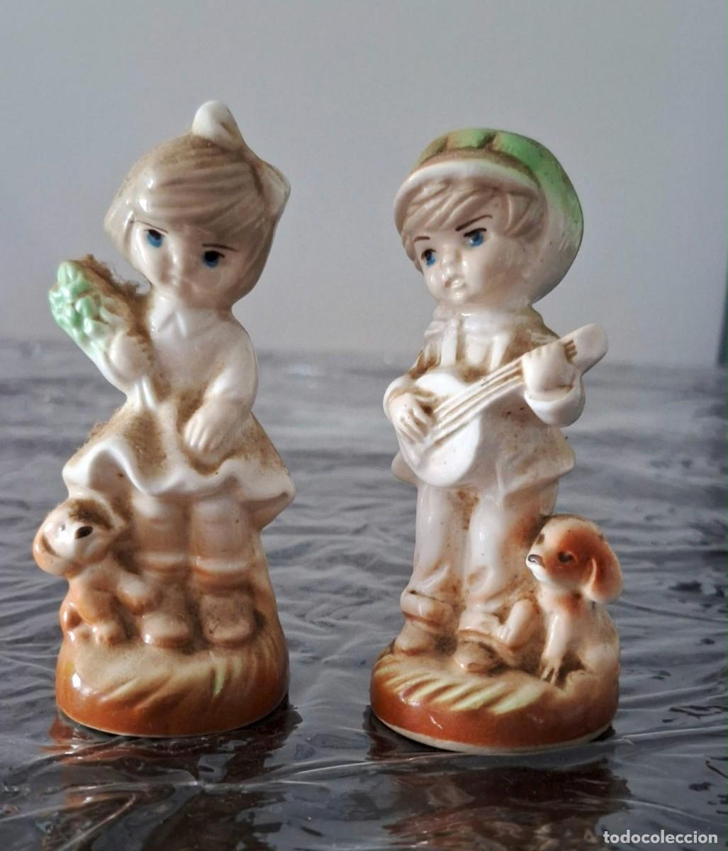 Antig&uuml;edades: Pareja de figuras de porcelana