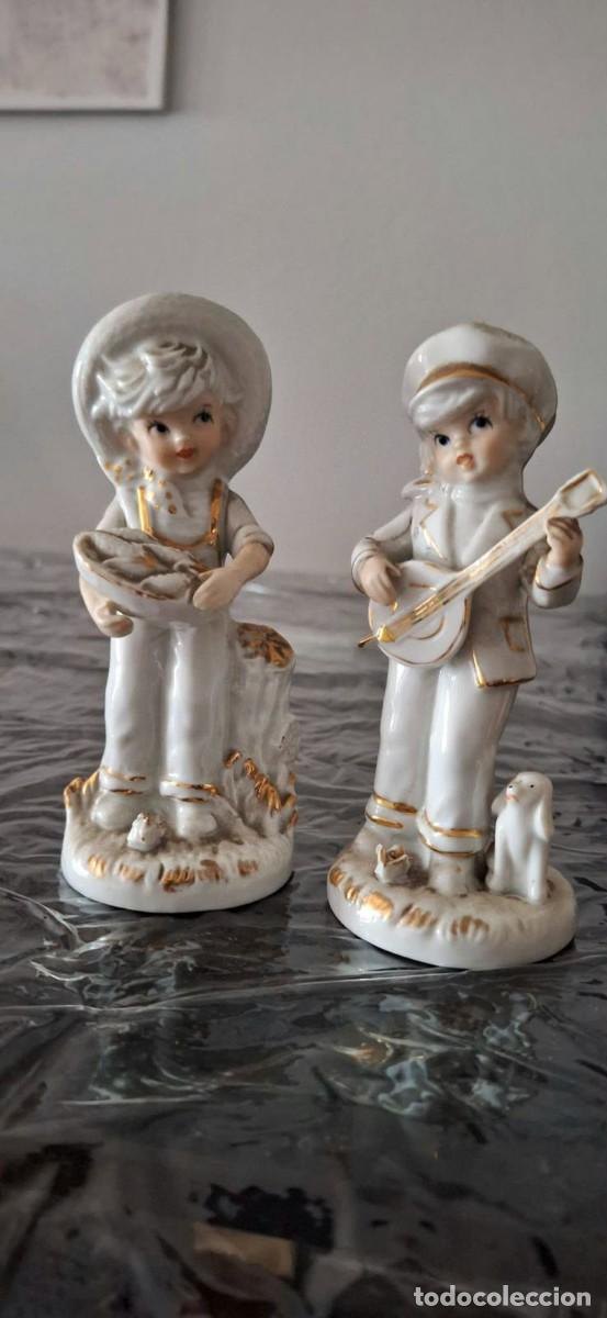 Antig&uuml;edades: Pareja de figuras de porcelana