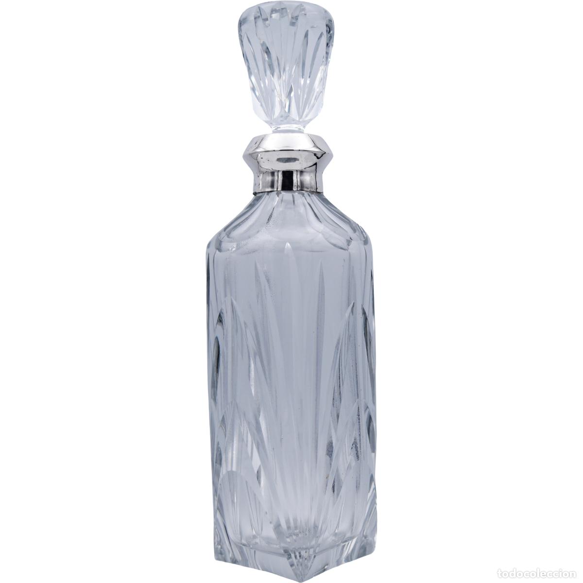 Antiguidades: Botella licorera con cuello de plata