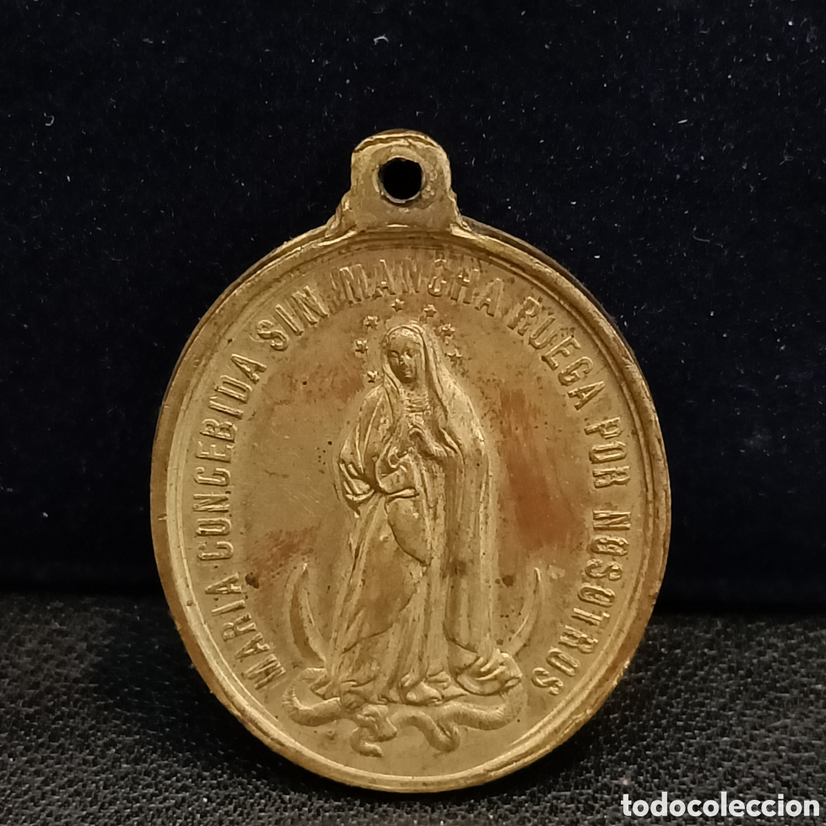 Antig&uuml;edades: Medalla de bronce de San Vicente Ferrer y Inmaculada Concepci&oacute;n.