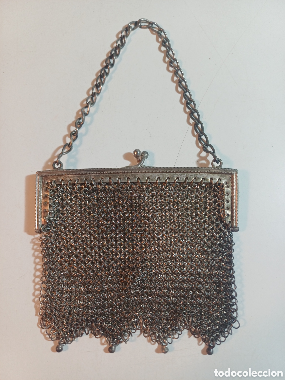 Antig&uuml;edades: Monedero bolsillo de plata contrastada