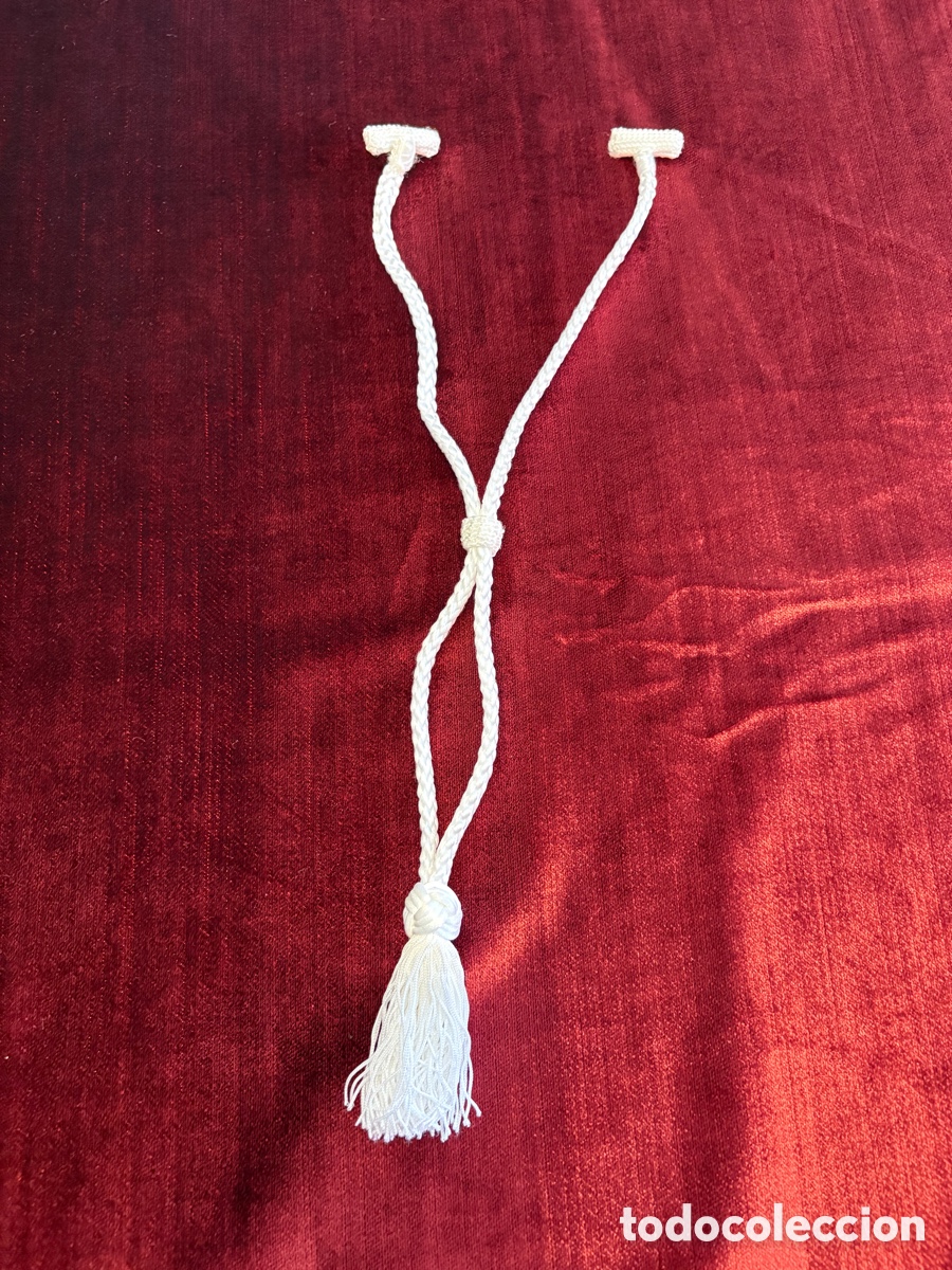Antig&uuml;edades: Fiador de color blanco