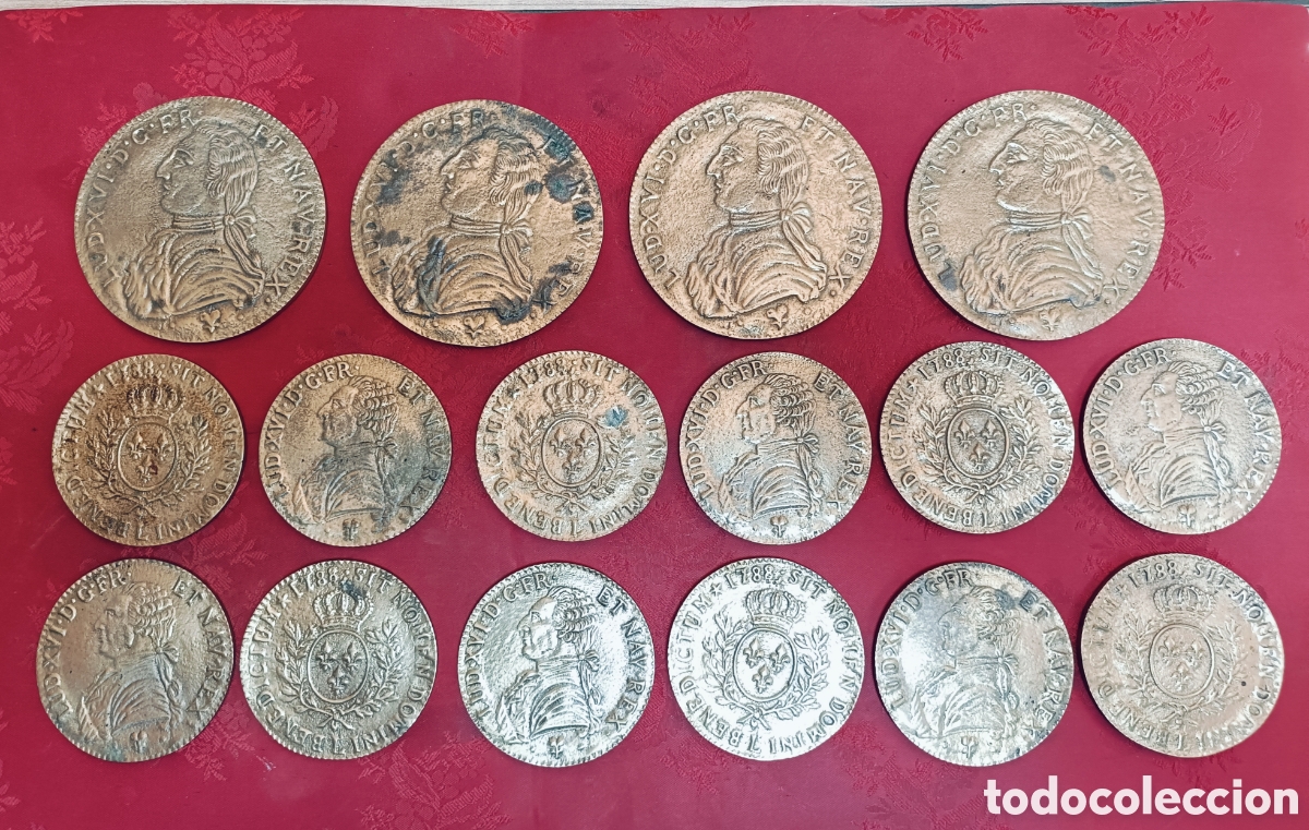 Antig&uuml;edades: SET DE 16 POSAVASOS , SALVAMANTELES. BRONCE. REPRODUCCION DE MONEDA DE LUIS XVI. SIGLO XX.