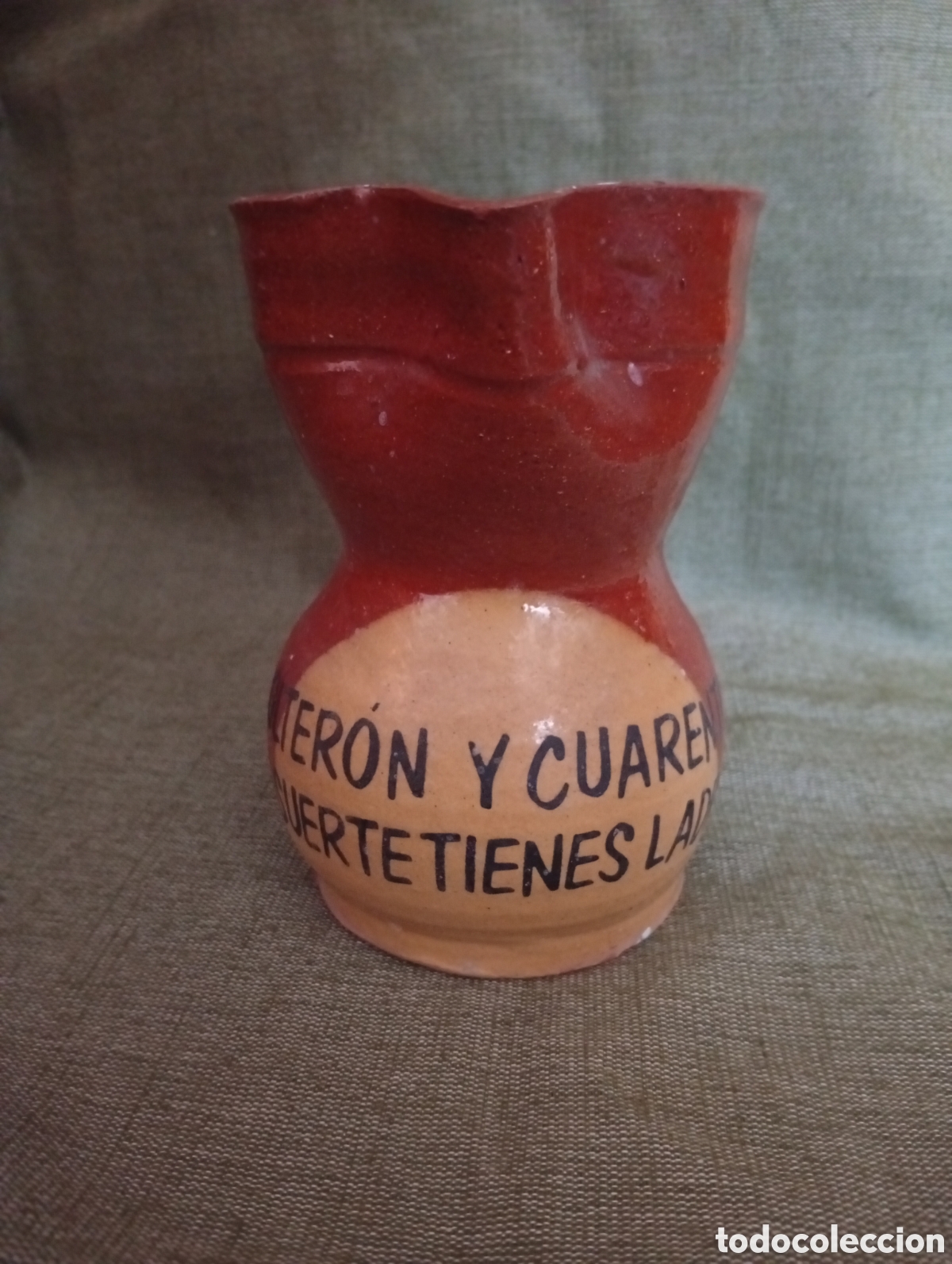 Antig&uuml;edades: Jarra barro cocido con un refr&aacute;n Solteron y cuarent&oacute;n
