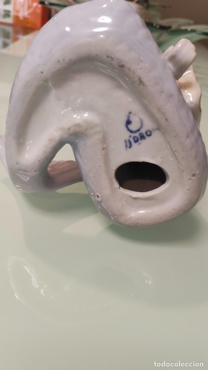 Antig&uuml;edades: Figura Sirena de porcelana