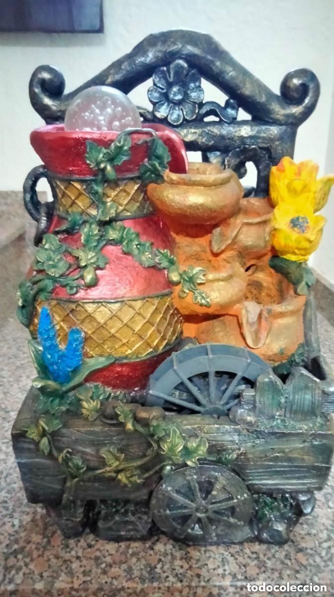 Antig&uuml;edades: preciosa fuente con bola giratoria y luces multicolores