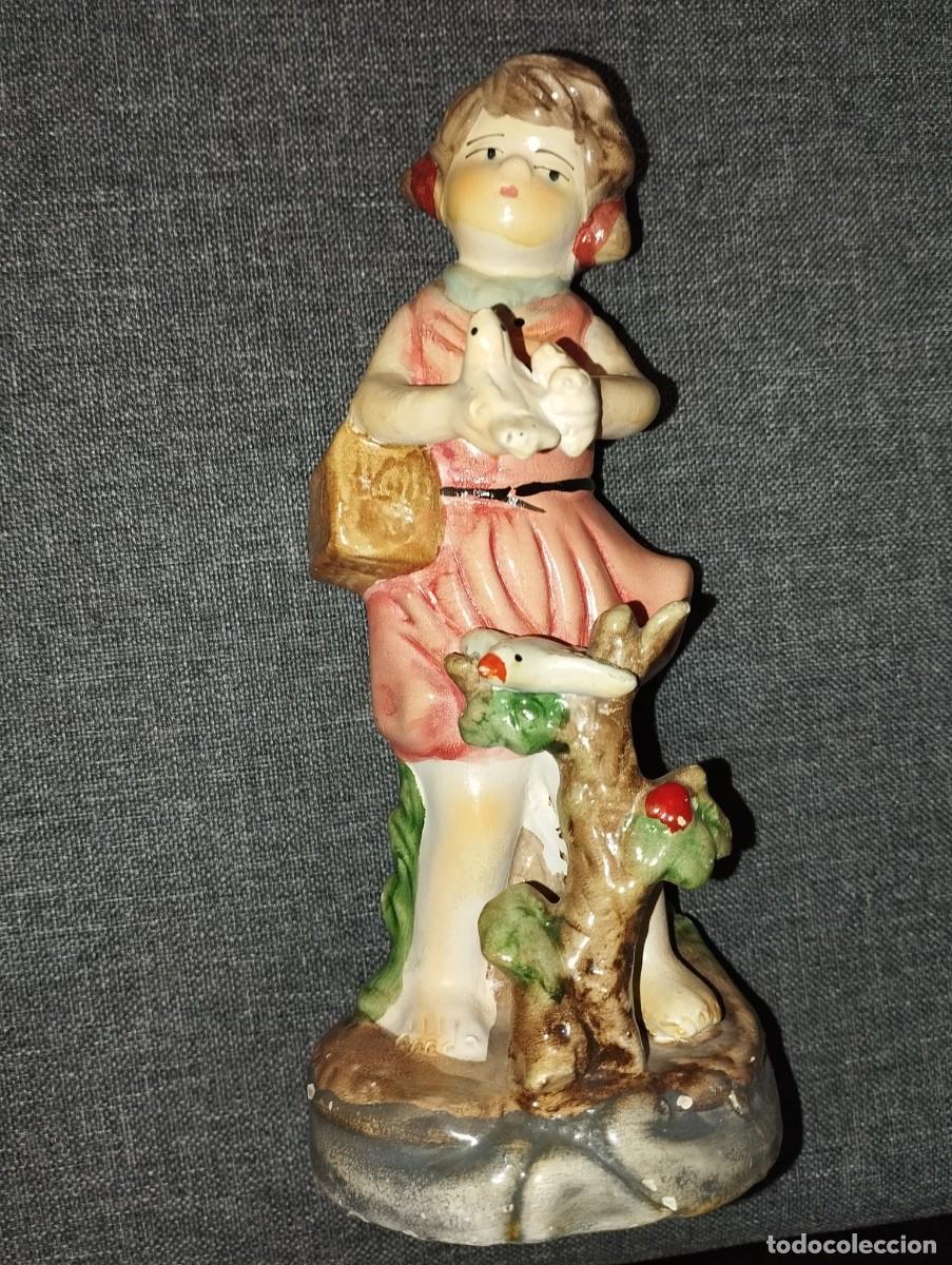 Antig&uuml;edades: figura de ni&ntilde;a adorno muy entra&ntilde;able