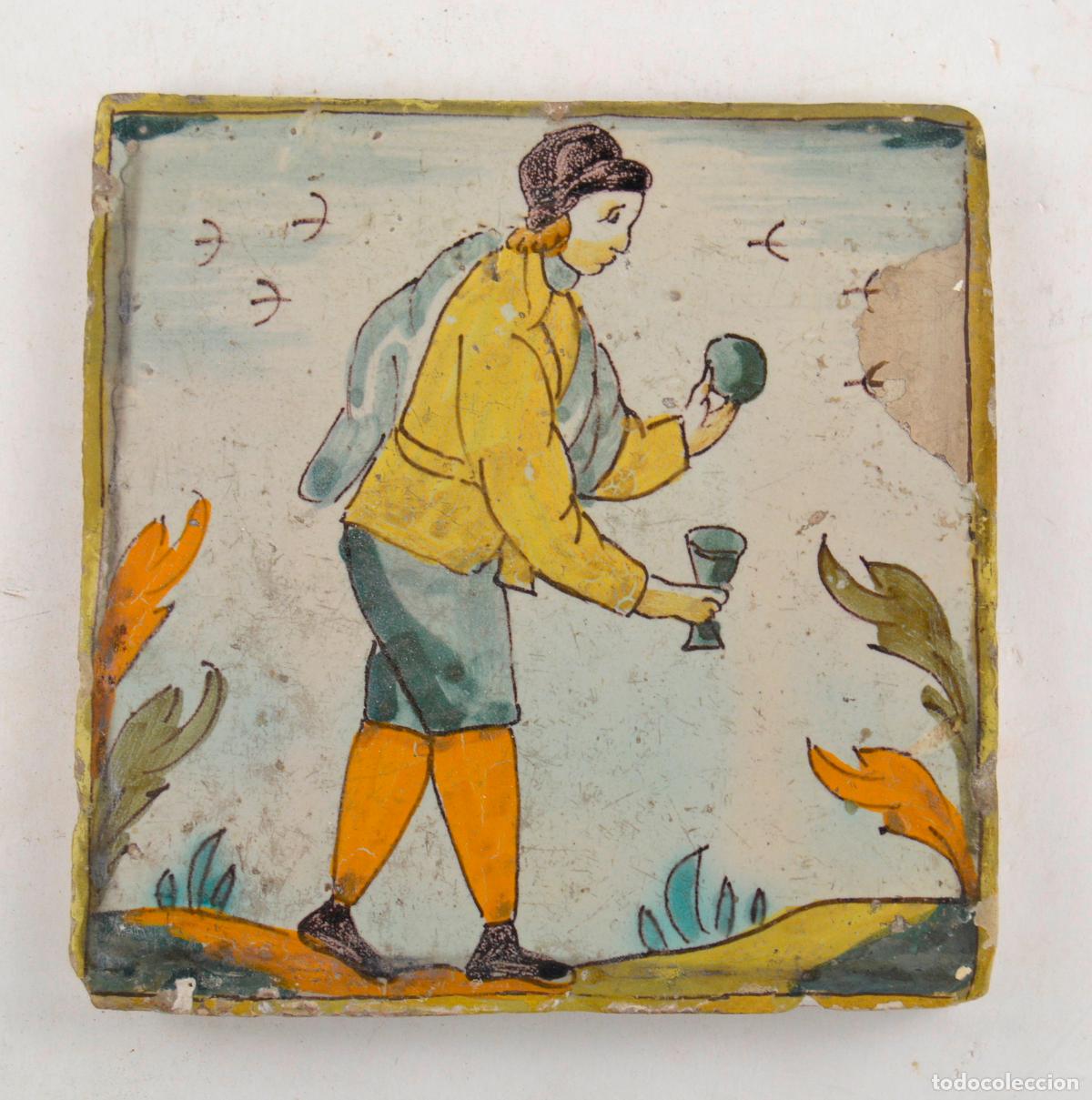Antig&uuml;edades: Hombre con copa, azulejo de cer&aacute;mica catalana, serie Arts i Oficis, siglo XVIII - XIX.