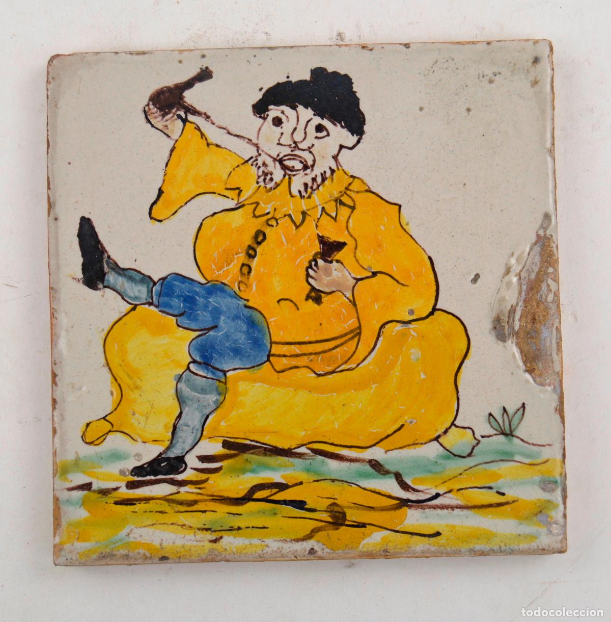 Antig&uuml;edades: Hombre bebiendo de un porr&oacute;n, azulejo de cer&aacute;mica catalana, serie Arts i Oficis, siglo XIX.