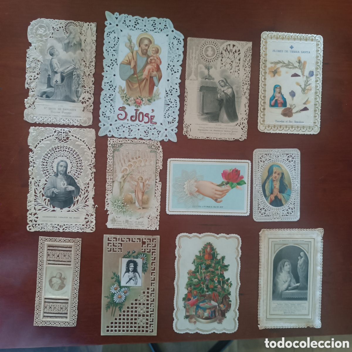 Antig&uuml;edades: Antiguas estampas troqueladas con puntillas. Lote de 12