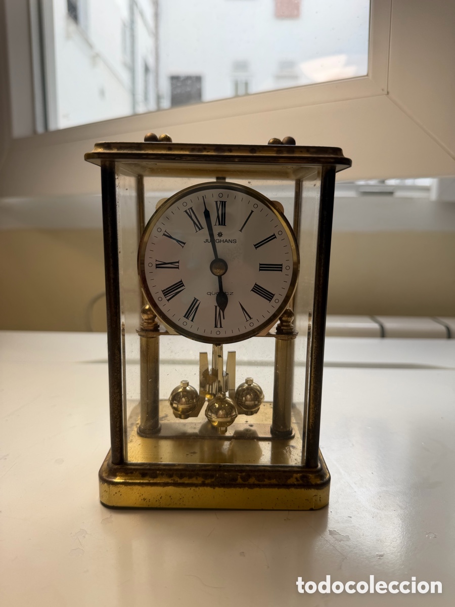 Antig&uuml;edades: Reloj Junghans vitrina lat&oacute;n antiguo 16x11cm