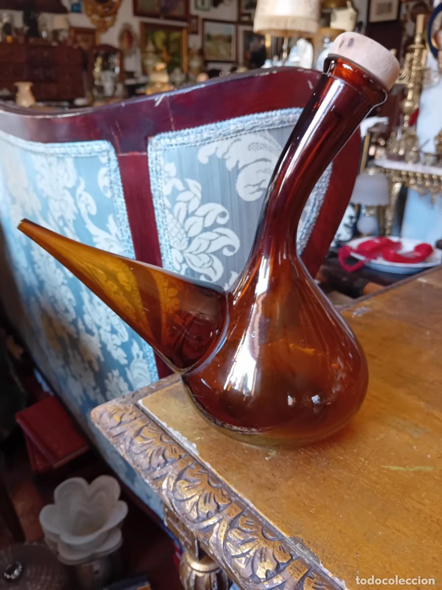 Antig&uuml;edades: Porr&oacute;n de cristal color &aacute;mbar siglo XX