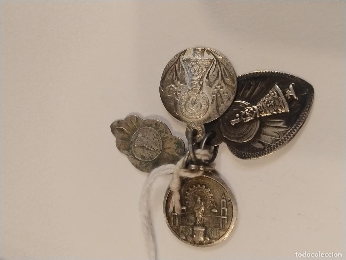Antig&uuml;edades: Lote de 4 medallas antiguas de la Virgen del Pilar. La mas grande mide 2 x 1,50 cm