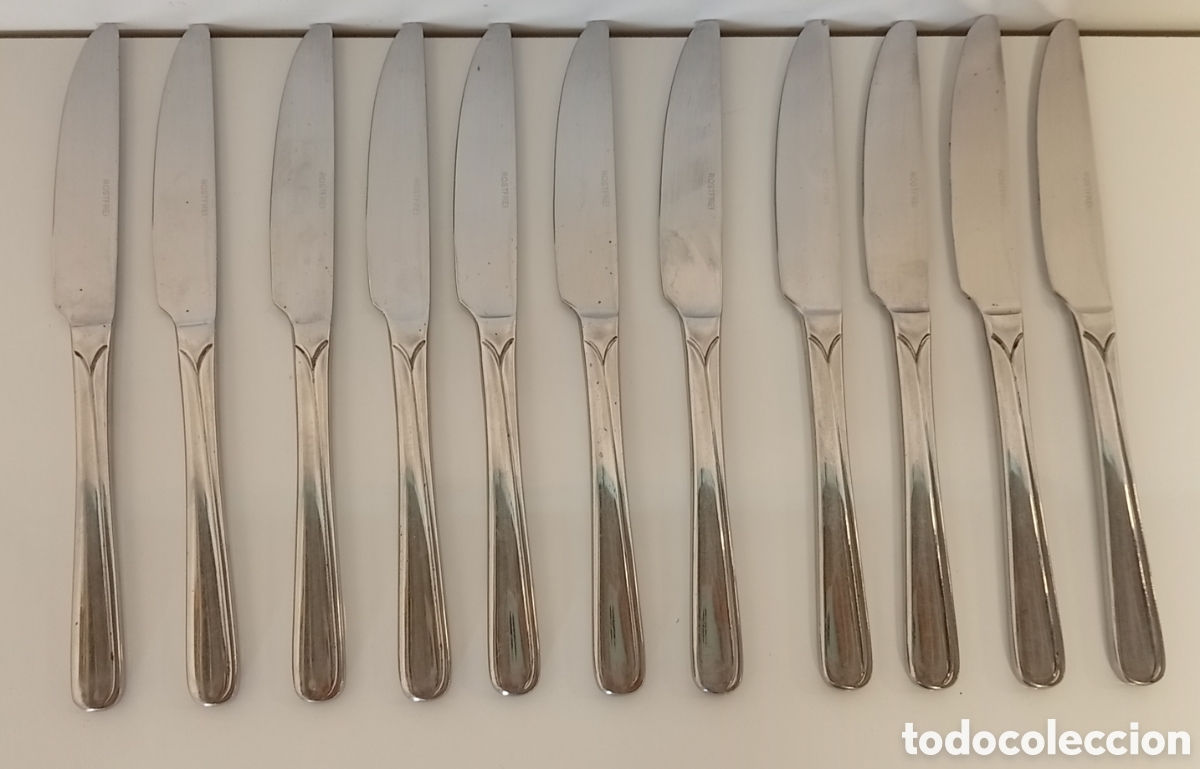 Antig&uuml;edades: .SET DE 11 CUCHILLOS ROSTFREI DE ACERO INOCIDABLE