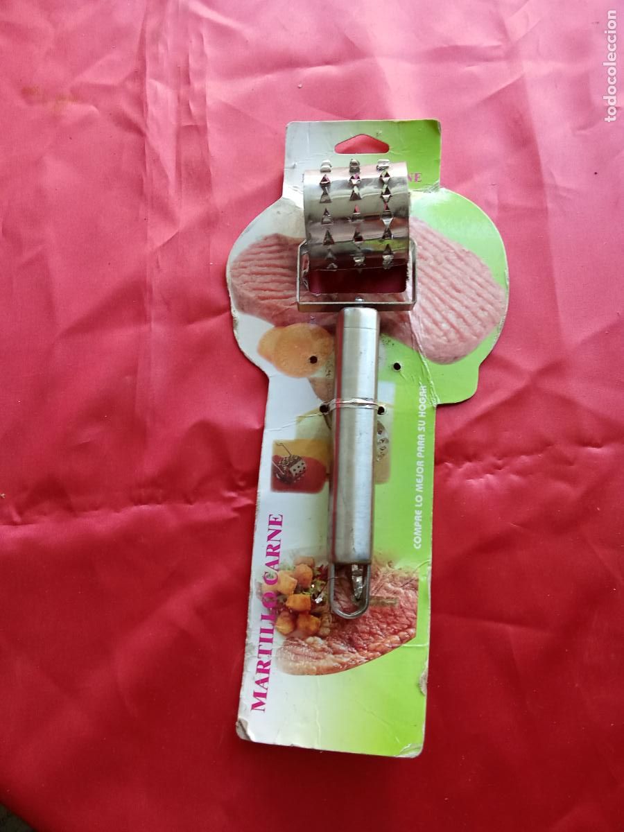 Antig&uuml;edades: Martillo de carne sin estrenar. Caja tornillos