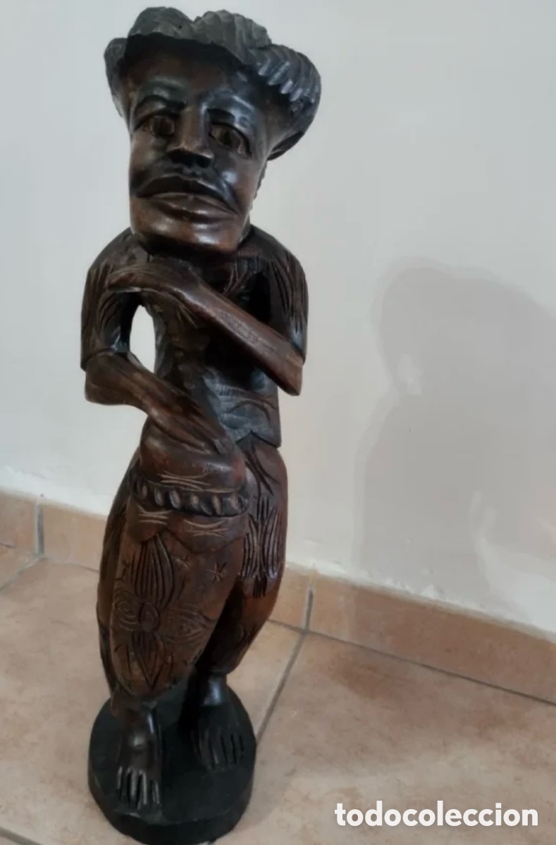 Antig&uuml;edades: Hombre de madera tallada