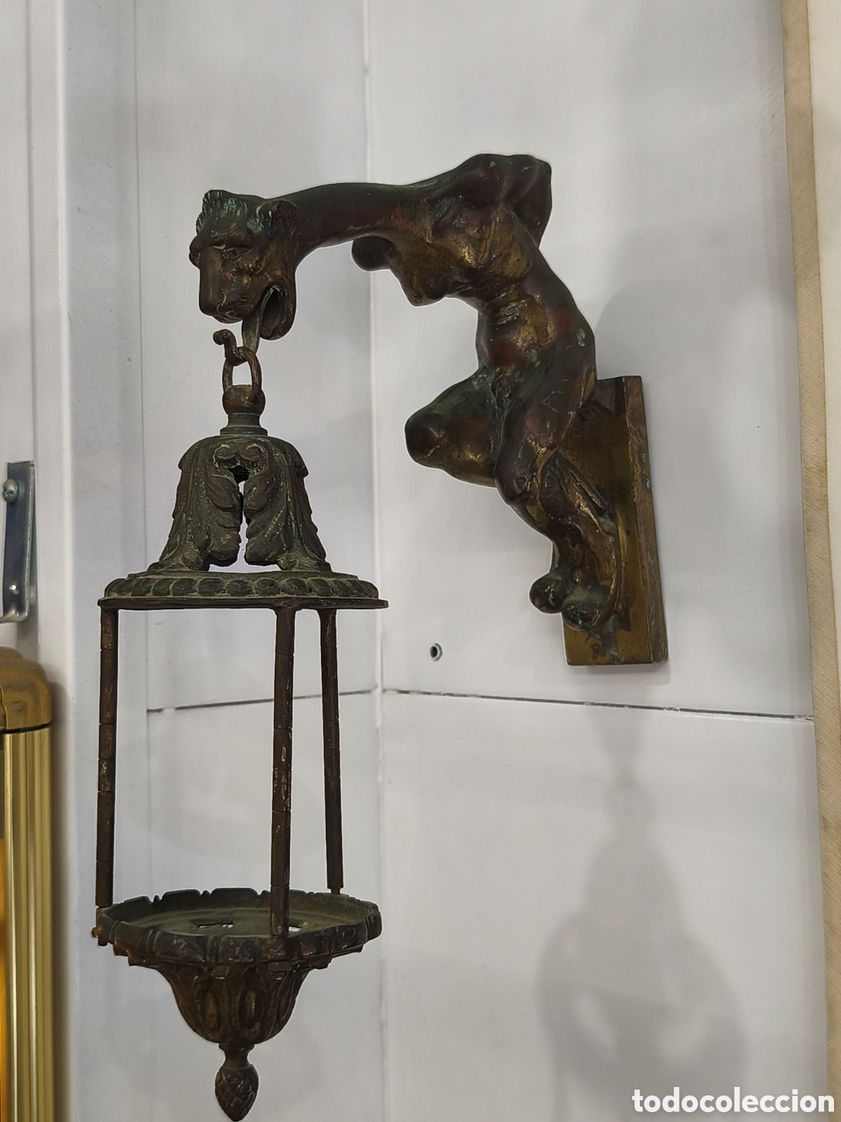 Antig&uuml;edades: Antigua g&aacute;rgola / aplique de bronce