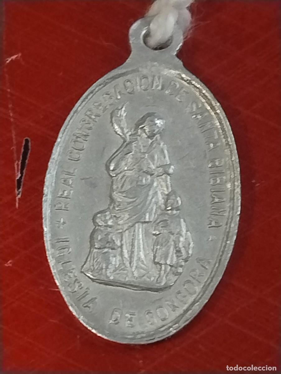Antig&uuml;edades: Antigua medalla de Santa Bibiana y &Aacute;ngel de la Guarda. Iglesia Gongoras. 2 x 1,50 cm
