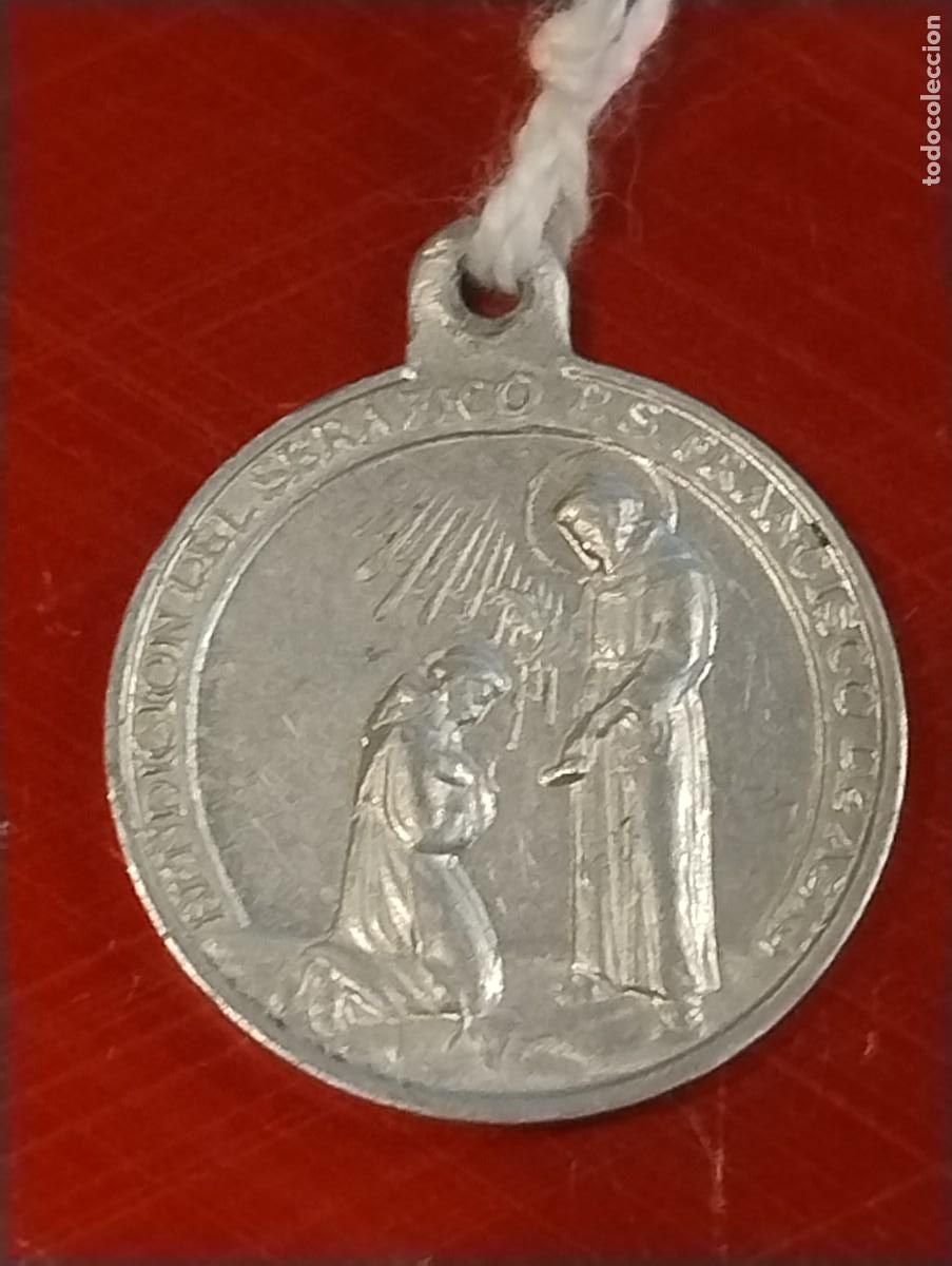 Antig&uuml;edades: Bonita medalla de San Francisco de Asis. Unos 2 cm de di&aacute;metro.