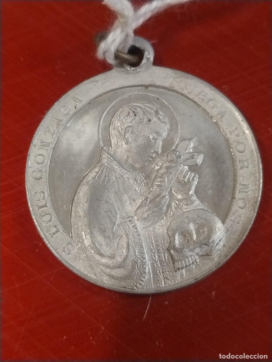 Antig&uuml;edades: Bonita medalla de San Antonio y San Luis Gonzaga. Unos 3 cm de di&aacute;metro.