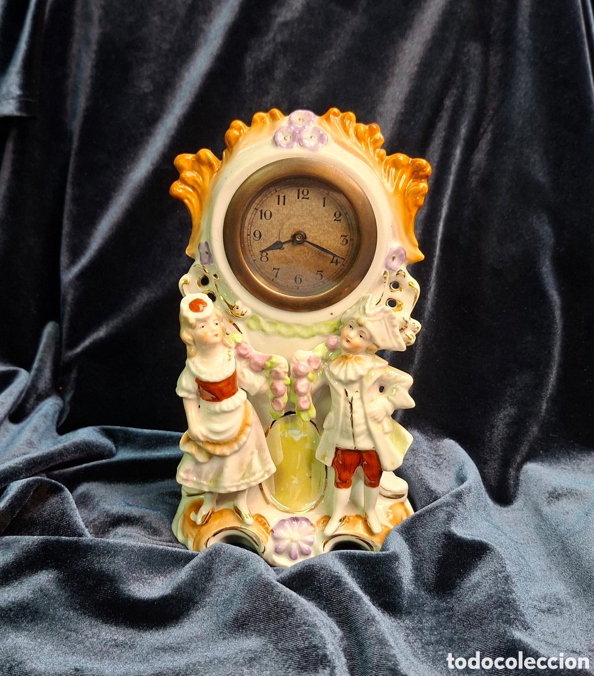 Antig&uuml;edades: Reloj de biscuit de principios del Siglo XX