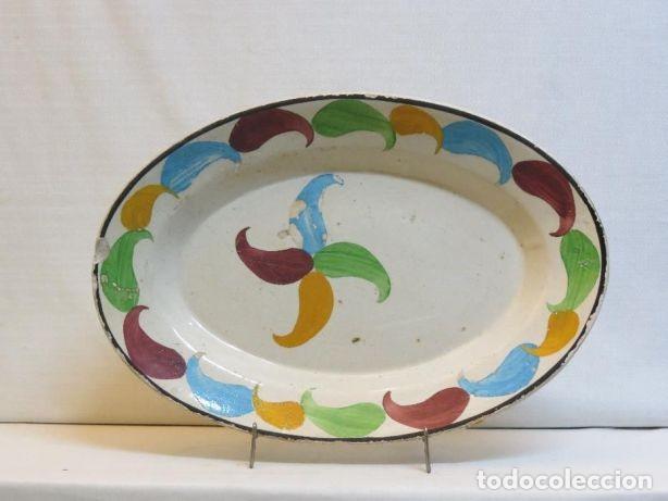 Antig&uuml;edades: Travessa oval, em faian&ccedil;a portuguesa, decorada com uma estrela, n&ordm;2; Fabrico Cavaco