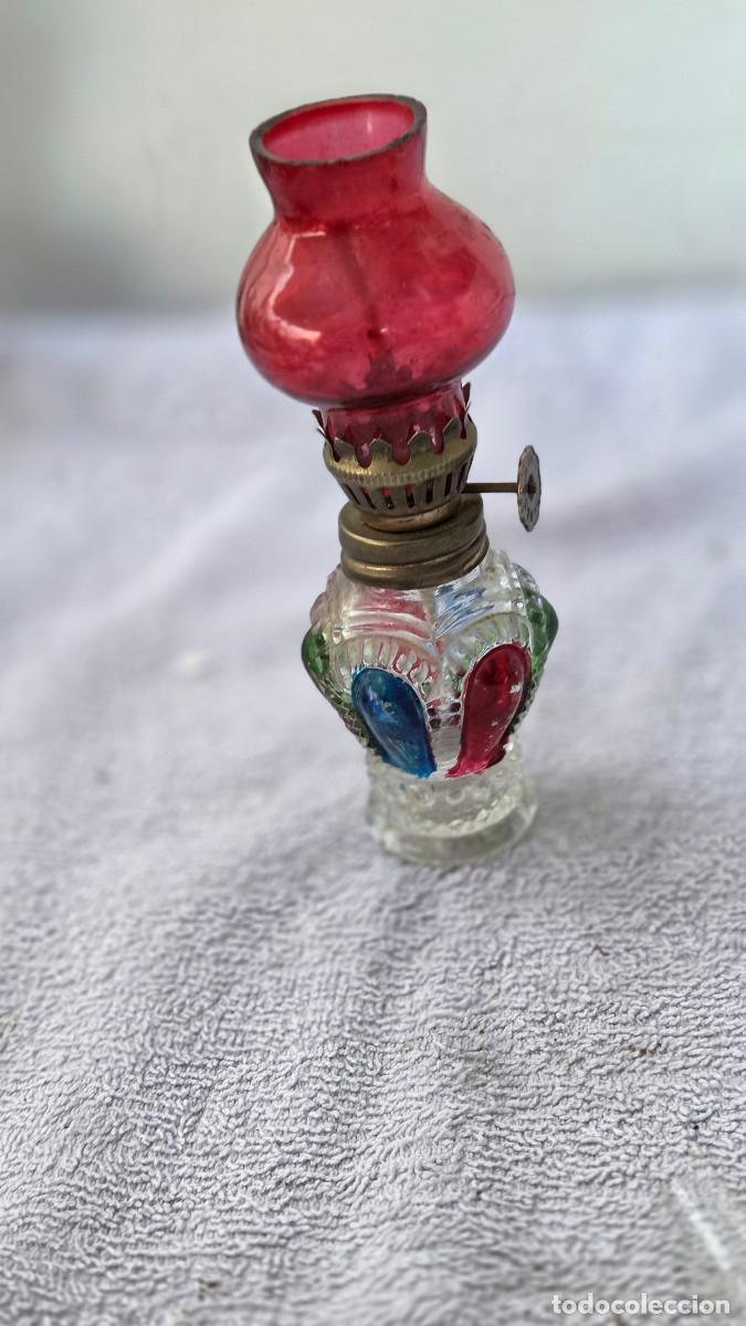 Antig&uuml;edades: quinque de cristal de colores
