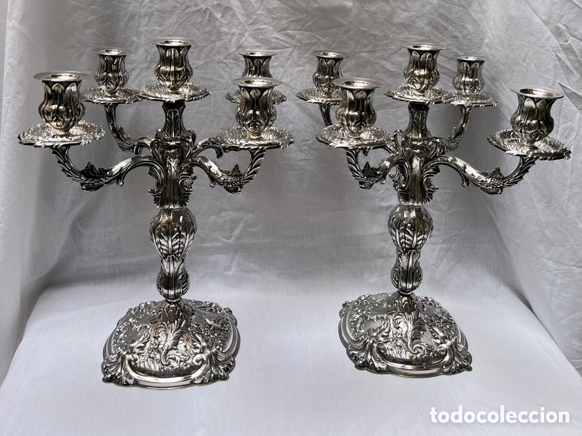 Antig&uuml;edades: Pareja de candelabros de plata siglo XIX