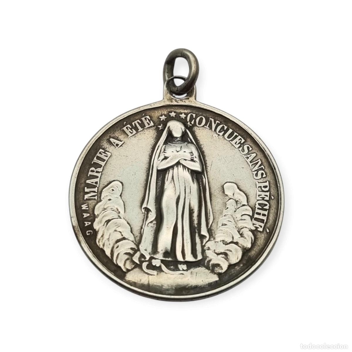 Antig&uuml;edades: Medalla francesa de la Inmaculada y Sagrado Coraz&oacute;n en plata, firmada Waag, ca. 1880-1905
